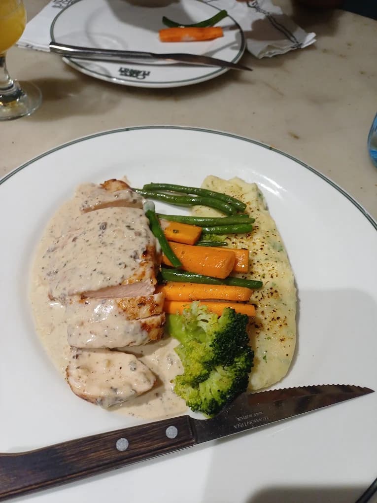 Herb-Crusted Chicken with Truffle Mash & Glazed Carrots